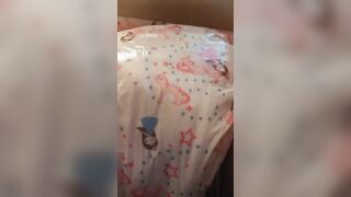 Cute little girl showing us how to pee a diaper 2