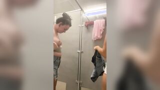 2 girls wearing a diaper