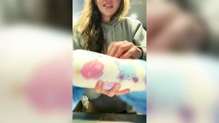 girl remove wet diaper