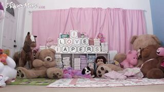 DpMNikkiStacksPampersLuvsBoxesNMessesOnThem
