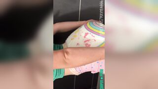 Full diaper girl under jeans
