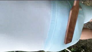 Diaper change by mommy out in the park