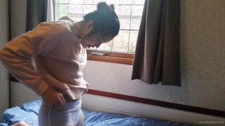 Girl mess her pullup and put a diaper on top of it