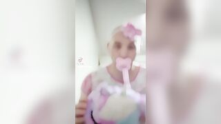 Sissy wearing diaper and onsie