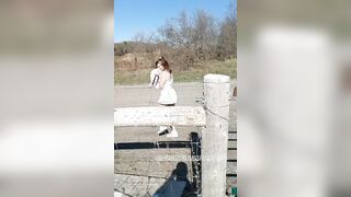 Baby girl climbs over fence