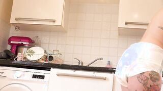 Dolly Cleaning The Kitchen