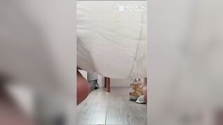 Messing and Wetting Her Diaper