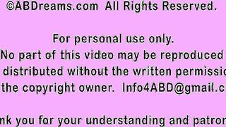 Mom breastfeeding in the kitchen