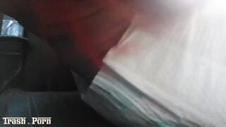 Latina woman messes her diaper in the car.
