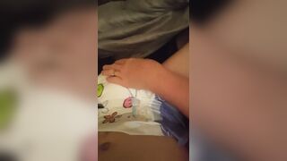 mommy checks a smelly diaper