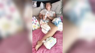 Cute girl masturbates in messy diaper