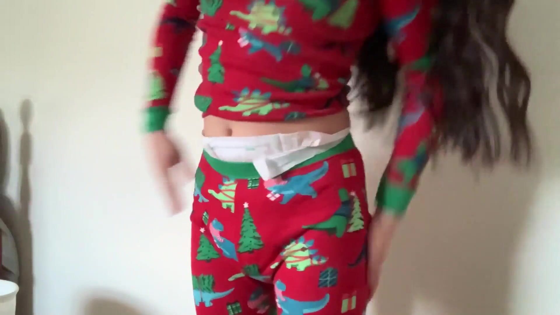 Lainey in diaper & Christmas pj's