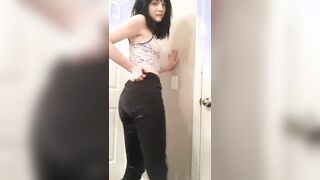 Abbi Nin wetting her black jeans