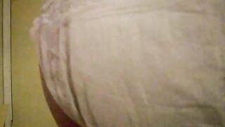 Chubby girl pooping diaper