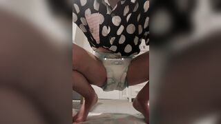 girl pees in diaper