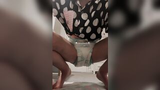 girl pees in diaper