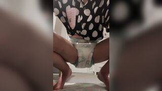 girl pees in diaper