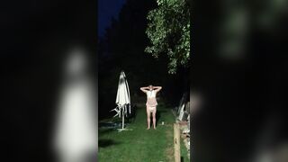 Baby being punished with hands on head in the garden