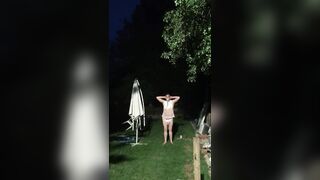 Baby being punished with hands on head in the garden