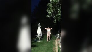 Baby being punished with hands on head in the garden