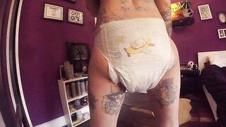 Lady pees and poops diaper