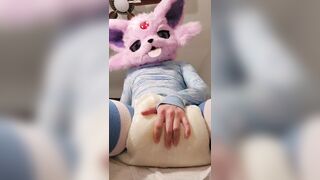Espeon suiter squishes their wet diaper