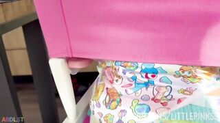 Baby girl has mess in high chair
