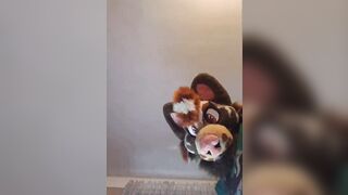 Cute diapered fursuiter sits on you