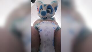 Fursuiter wets their diaper over you