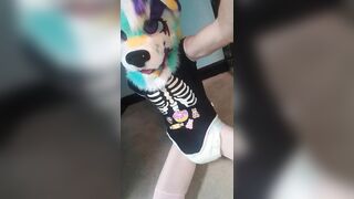 Fursuiter pees their wet diaper on ground