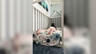 Nica Shows Off Her Diaper In Her Crib