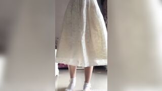 ABDL Asian Girl changes her diaper while standing up