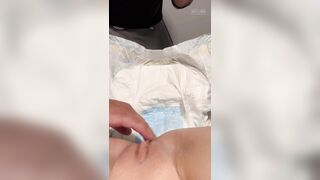 Diaper girl gets changed