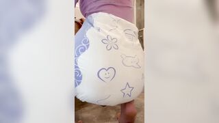 Girl blows up diaper