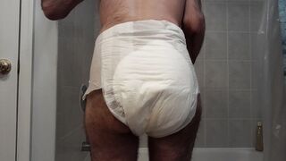 small poop/#2/mess into diaper standing