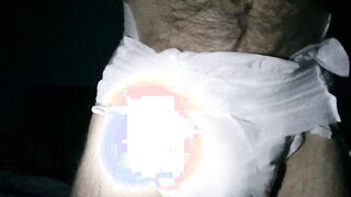 wet diaper at night w/ flashlight on