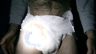 wet diaper at night w/ flashlight on