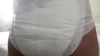 girl wetting her diaper